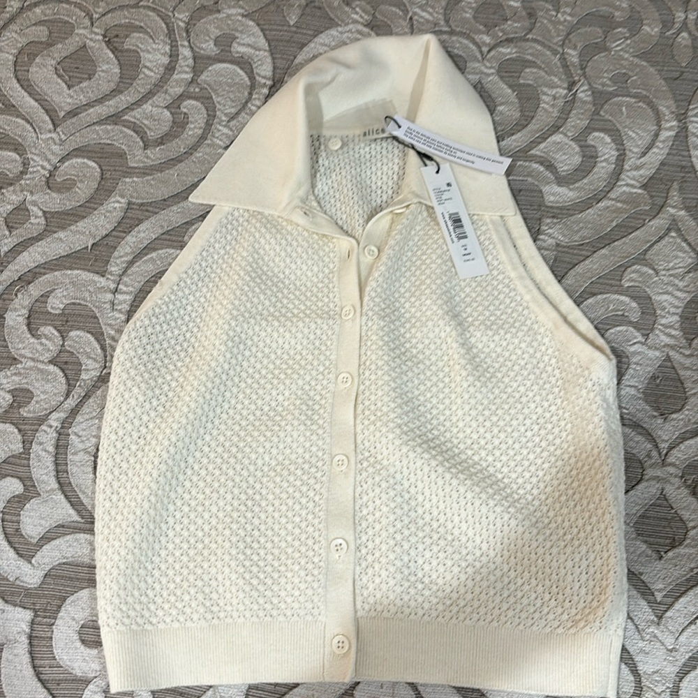 Alice and Olivia. Beige top / light material .New with tags. Medium